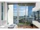 City view from a bright living room balcony with patio furniture at 3324 Peachtree Ne Rd # 1304, Atlanta, GA 30326