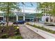 Contemporary building with covered entrance, meticulous landscaping, and ample parking at 3324 Peachtree Ne Rd # 1304, Atlanta, GA 30326