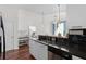 Modern kitchen with stainless appliances, a work desk and black subway tile backsplash at 3324 Peachtree Ne Rd # 1304, Atlanta, GA 30326