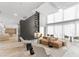 Expansive lounge area with stylish seating, modern decor, and tall windows offering abundant natural light at 3324 Peachtree Ne Rd # 1304, Atlanta, GA 30326