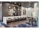 Stylish lounge area with a long countertop, bar stools, elegant lighting, and modern décor at 3324 Peachtree Ne Rd # 1304, Atlanta, GA 30326