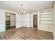 Formal dining room boasting hardwood floors and built-in cabinets at 4981 Forestglade Ct, Stone Mountain, GA 30087