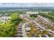 An aerial view shows the location of the home in relation to parks, schools, and major roadways at 548 Azalea Bloom Drive E, Loganville, GA 30052
