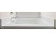 Clean and well-maintained white bathtub with chrome fixtures at 548 Azalea Bloom Drive E, Loganville, GA 30052