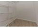 Walk-in closet with shelving for clothing and storage, perfect for keeping belongings organized at 1074 Cherokee Hts, Stone Mountain, GA 30083