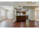 Expansive living area featuring modern flooring and easy access to kitchen at 1074 Cherokee Hts, Stone Mountain, GA 30083
