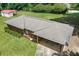 An aerial view shows the house with new roof, landscaping and a spacious, well-maintained lawn at 232 Hembredge Dr, Canton, GA 30115