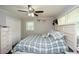 Cozy bedroom with hardwood floors, deer antler decor, and comfortable white furniture at 232 Hembredge Dr, Canton, GA 30115