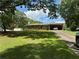 All brick home with a level yard, a carport, and a detached storage building at 232 Hembredge Dr, Canton, GA 30115