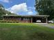 All brick single story home with a level yard and a convenient carport at 232 Hembredge Dr, Canton, GA 30115