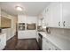 Modern kitchen with white cabinets, stainless steel appliances, and plenty of counter space at 232 Hembredge Dr, Canton, GA 30115