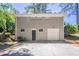 Backyard features garage access, lawn and mature trees at 2755 Rockcliff Se Rd, Atlanta, GA 30316