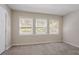 Bedroom featuring carpet and a double window, offering ample natural light at 2755 Rockcliff Se Rd, Atlanta, GA 30316