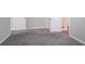 Bedroom featuring gray carpet and two closets at 2755 Rockcliff Se Rd, Atlanta, GA 30316