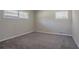 Cozy bedroom with neutral carpet and a window, creating a serene atmosphere at 2755 Rockcliff Se Rd, Atlanta, GA 30316