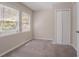 Bedroom with carpet, dual windows, and a closet at 2755 Rockcliff Se Rd, Atlanta, GA 30316
