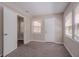 Bedroom features carpet and a door for outside access at 2755 Rockcliff Se Rd, Atlanta, GA 30316