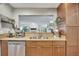 This kitchen features stainless steel appliances and an open design, connecting seamlessly to the main living area for modern living at 301 Mill Pond Se Ct, Smyrna, GA 30082