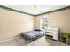 Bedroom with neutral walls, carpet floors, and a window with natural light at 531 Chadborn Ct, Lawrenceville, GA 30045