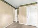 Bedroom featuring neutral walls, carpet floors, and a door leading to another room at 531 Chadborn Ct, Lawrenceville, GA 30045