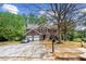 Traditional brick two-story home with green shutters and a two-car garage at 531 Chadborn Ct, Lawrenceville, GA 30045