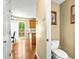 Open hallway view of the kitchen, toilet room, and dining area at 531 Chadborn Ct, Lawrenceville, GA 30045
