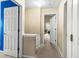 Upstairs hallway showing the vaulted ceiling and neutral carpeting at 531 Chadborn Ct, Lawrenceville, GA 30045