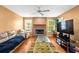 The living room features a cozy fireplace, hardwood floors and plenty of light at 531 Chadborn Ct, Lawrenceville, GA 30045