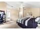 Large main bedroom with high ceilings, ceiling fan and an ensuite bath at 531 Chadborn Ct, Lawrenceville, GA 30045