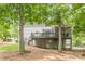 Exterior backyard view showing deck, screened porch, and walkout basement at 4314 Arbor Bridge Ct, Marietta, GA 30066