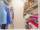 Neatly arranged closet with clothes and household items at 4314 Arbor Bridge Ct, Marietta, GA 30066