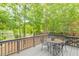 Back deck perfect for outdoor dining and relaxation overlooking wooded backyard at 4314 Arbor Bridge Ct, Marietta, GA 30066
