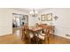 Formal dining room showcasing hardwood floors, chandelier, and access to the living room at 4314 Arbor Bridge Ct, Marietta, GA 30066