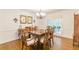 Open dining room with hardwood floors and access to the outdoor area at 4314 Arbor Bridge Ct, Marietta, GA 30066