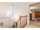 Bright hallway features a chandelier and leads to other rooms of the house at 4314 Arbor Bridge Ct, Marietta, GA 30066