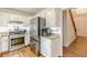 Kitchen with stainless steel appliances, white cabinets, and a granite countertop at 4314 Arbor Bridge Ct, Marietta, GA 30066