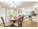 Kitchen with dining area with a sliding door to the outside area and stainless steel appliances at 4314 Arbor Bridge Ct, Marietta, GA 30066
