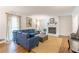 Comfortable living room with a large sectional, fireplace, and plenty of natural light at 4314 Arbor Bridge Ct, Marietta, GA 30066