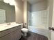 Bathroom featuring a vanity with a white countertop and stylish lighting at 5726 Silver Lake Dr, Mableton, GA 30126