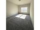 Bedroom with carpet flooring and a window at 5726 Silver Lake Dr, Mableton, GA 30126
