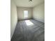 Bedroom with carpet flooring and a window at 5726 Silver Lake Dr, Mableton, GA 30126