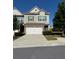 Charming two-story home with a two-car garage and well-maintained landscaping at 5726 Silver Lake Dr, Mableton, GA 30126