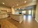 Open kitchen boasts granite countertops, a large island, and seamless flow to the living area at 5726 Silver Lake Dr, Mableton, GA 30126