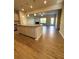 Bright living room with fireplace and hardwood flooring, perfect for entertaining guests at 5726 Silver Lake Dr, Mableton, GA 30126