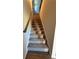 Carpeted stairs leading to the next level of the home at 5726 Silver Lake Dr, Mableton, GA 30126