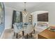 Elegant dining room with stylish lighting and modern accents at 7540 Shadburn Ferry Rd, Cumming, GA 30041