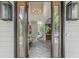 Grand foyer with high ceilings, modern lighting, and elegant decor at 7540 Shadburn Ferry Rd, Cumming, GA 30041