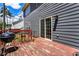 Exterior view of a deck with a grill, outdoor seating, and a sliding glass door at 209 Courtland Oaks Sw Dr, Marietta, GA 30060