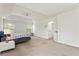 Spacious main bedroom with large windows and carpet floors at 209 Courtland Oaks Sw Dr, Marietta, GA 30060