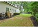 Well-maintained backyard with a lush lawn, tidy landscaping, and a sparkling pool, perfect for relaxation at 4015 Wieuca Ne Rd, Atlanta, GA 30342